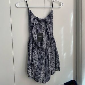 Forever 21 romper. Perfect condition with tags!! Size S